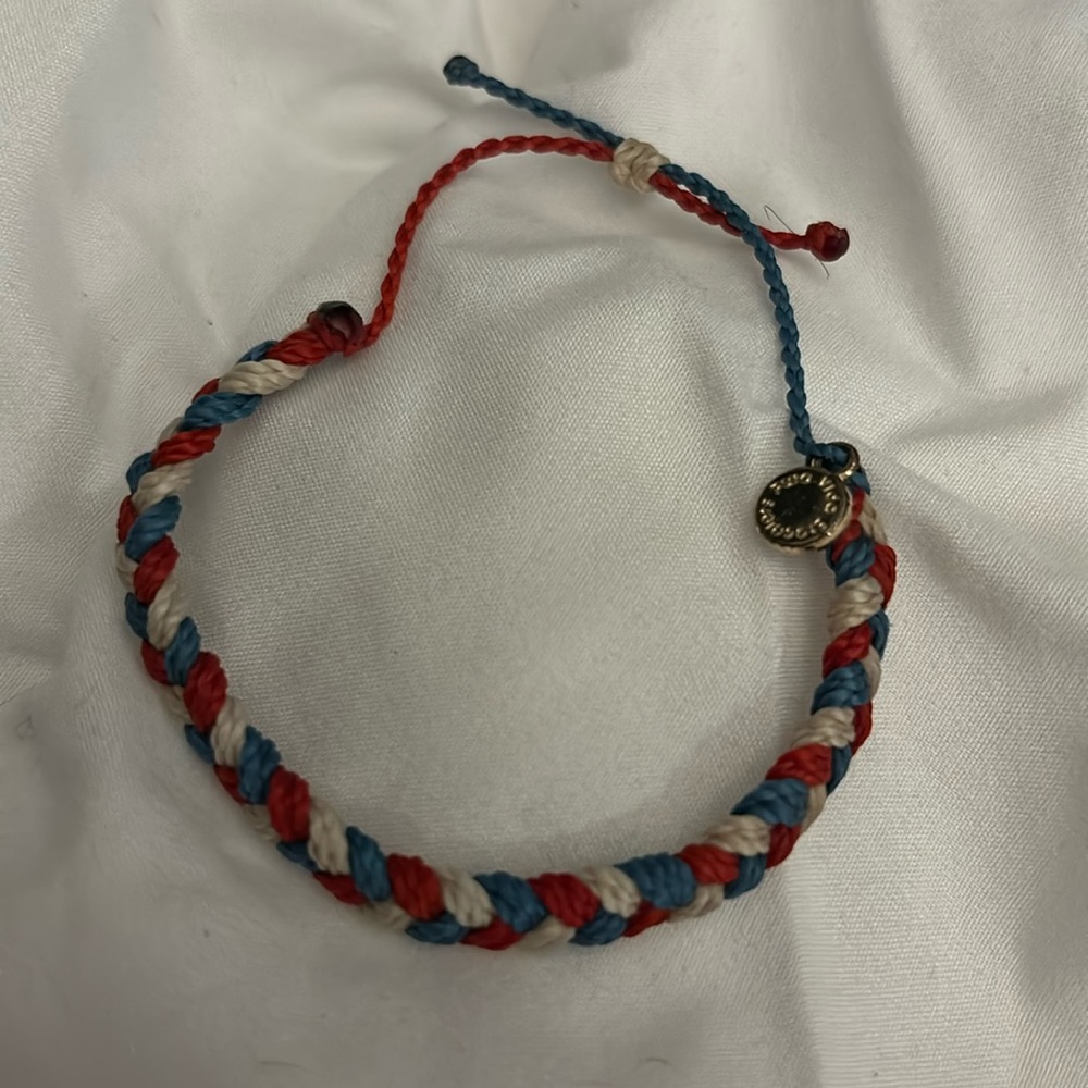 Pura vida red white and blue braided bracelet